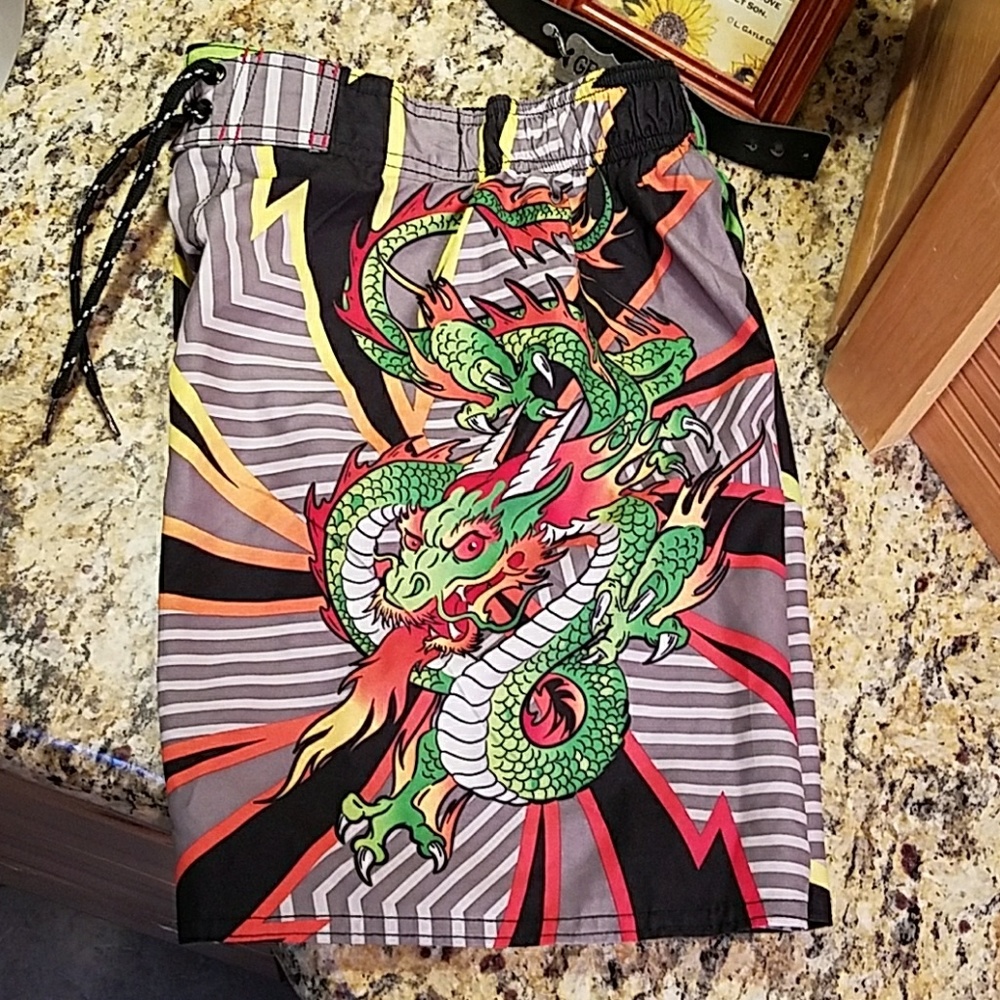 Boy's dragon swimsuit,  GUC, size 6 small